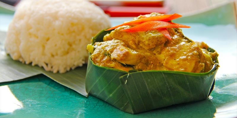 fish amok wrapped in banana leaves